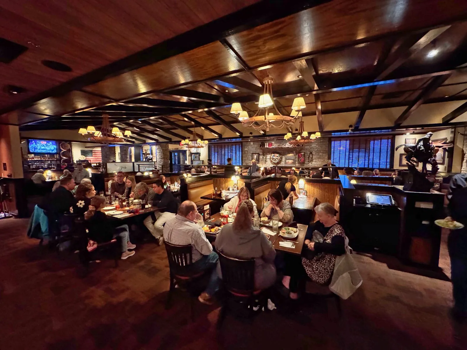 Restaurant dining room set for dinner service